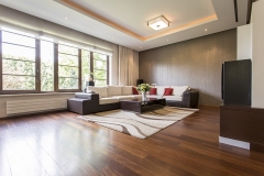 Modern living room design with brown parquet