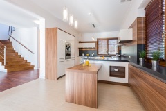 Spacious bright kitchen with wooden units